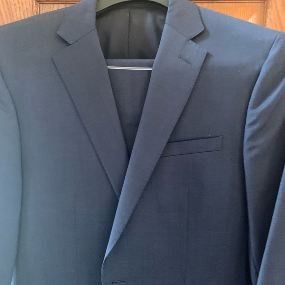 2 Calvin Klein mens suits from Mens Warehouse. Pants 33x29. Jacket ~36